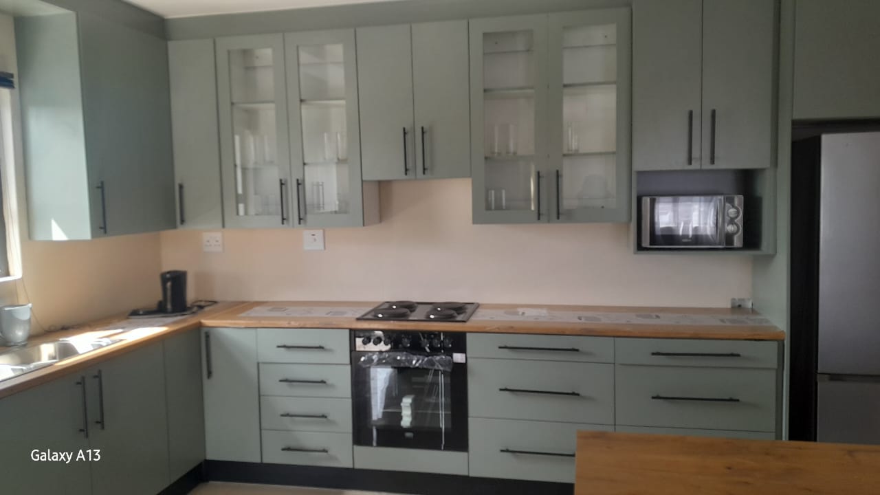 Dark kitchen cabinetry detail